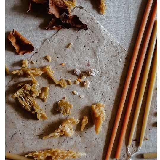 Three seasonal colours of Skär Organics dinner candles, styled and photographed by Fraser Malyk